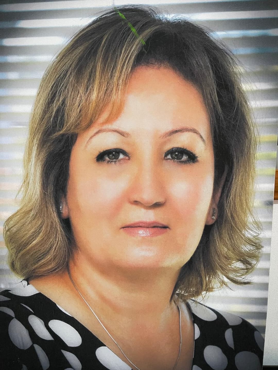 Portrait of dentist Raja Al-Owbadi